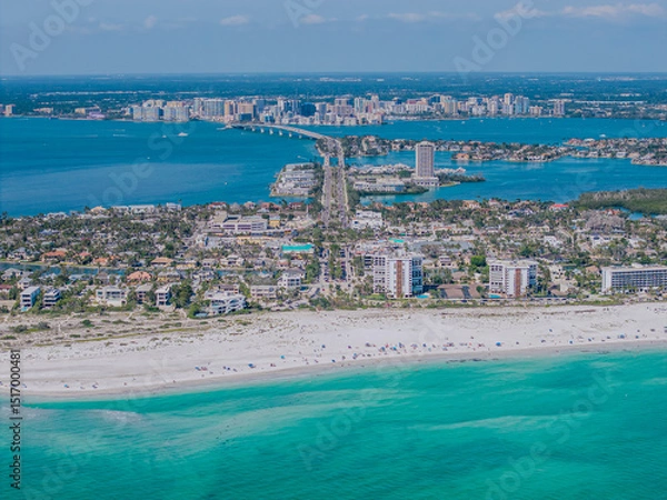 Fototapeta Beautiful aerial view of Sarasota, the magnificent white sand beach, and its iconic St. Armands Circle