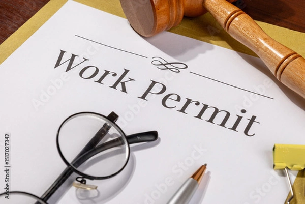 Fototapeta Work Permit Document on Desk Beside Gavel – Immigration Law Theme