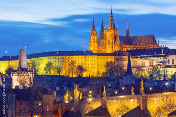 Fototapeta Illuminated St Vitus Cathedral and Charles Bridge at night in Prague Czech Republic