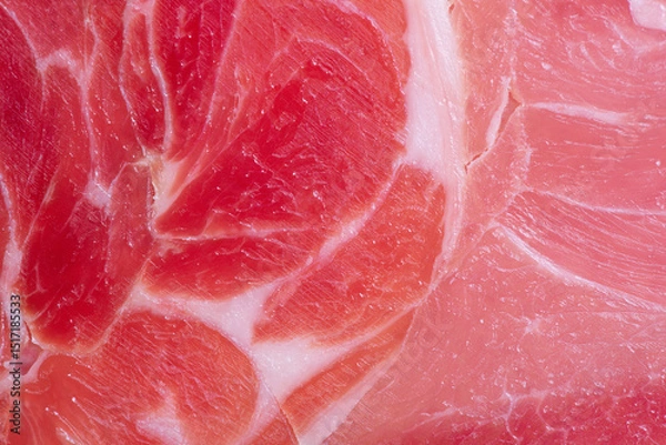 Fototapeta Thinly sliced ham meat as a background macro photo.