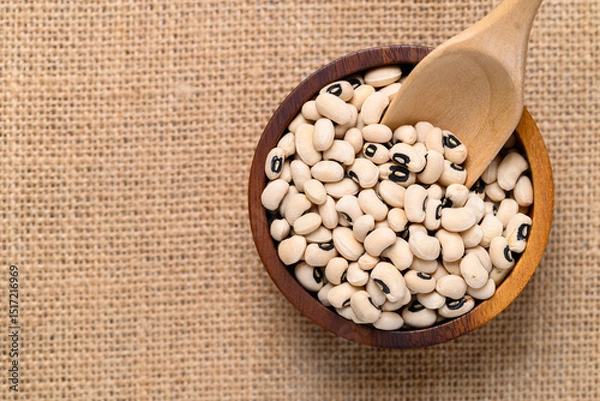 Obraz Black-eyed pea or cowpea in wooden bowl with scoop, Food ingredient, Top view