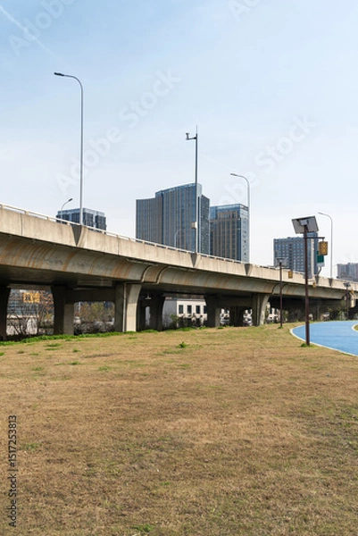 Fototapeta Highway overpass modern city skyline background