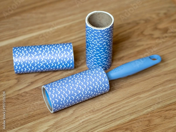 Obraz Lint roller set. Easily removes dust, hair, lint and crumbs. Cleaning clothes from stuck-on dirt 