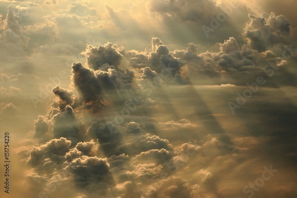 Fototapeta aerial view of warm color cloud with light ray and sun beam