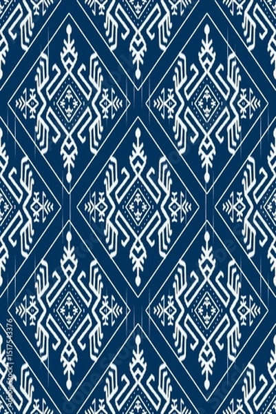 Fototapeta Ethnic abstract ikat art .Geometric ethnic seamless pattern  design for carpet,curtain,clothing,fabric,wrapping paper,tiles,textiles,batik,texture and wallpaper.