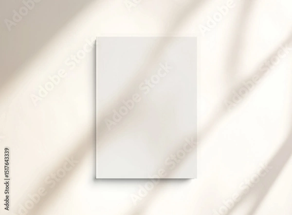 Fototapeta Empty book cover with shadows Mockup. Blank template of a catalog on white. 3D rendering