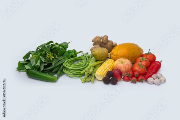 Fototapeta Fresh fruits and vegetables with white background