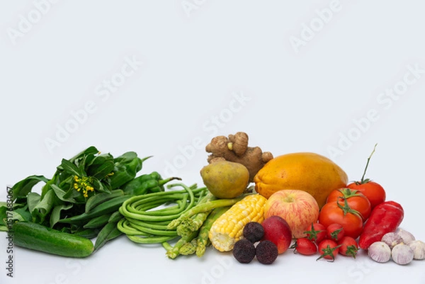 Fototapeta Fresh fruits and vegetables with white background