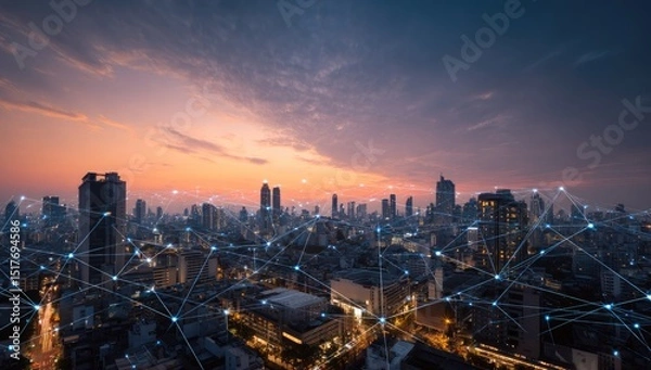 Fototapeta Cityscape at dusk, connected by network lines