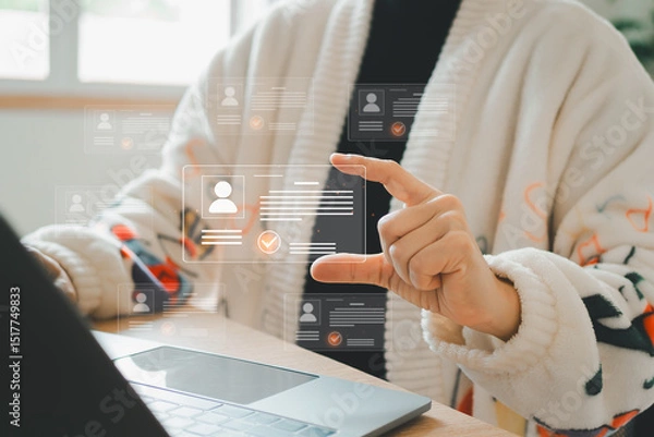 Fototapeta Digital identification or digital ID concept. Businesswoman use laptop and hand touch virtual screen of digital identification card to accessing databases by digital identity for cyber security.