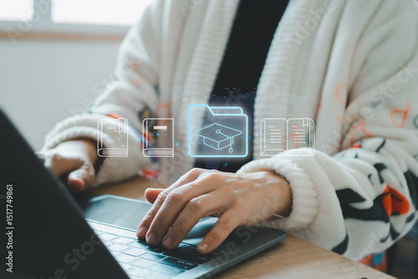 Fototapeta Internet education concept, e-learning resources, e-library, e-book, distant online courses. Businesswoman using laptop e-book icons on virtual screen.
