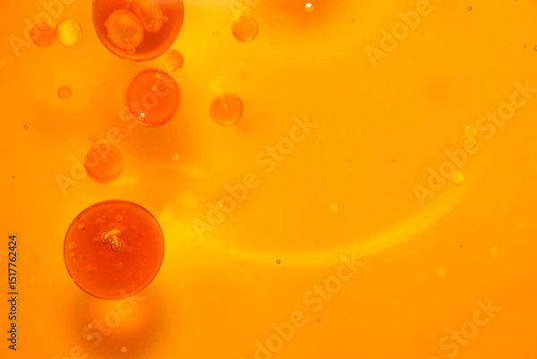 Fototapeta Orange Background with Floating Bubbles and Abstract Features