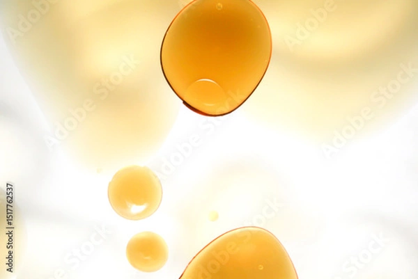 Fototapeta Abstract composition of golden droplets on a light background