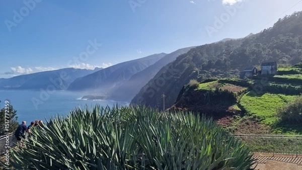 Fototapeta The coastal cliffs of Madeira Island offer breathtaking lookouts overlooking the vast Atlantic Ocean, where rugged rock formations meet endless blue waters. These viewpoints provide visitors with stun