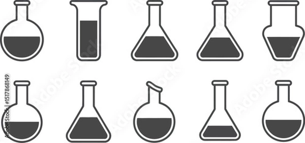 Fototapeta A collection of ten different laboratory glassware items filled with a dark liquid on a white background