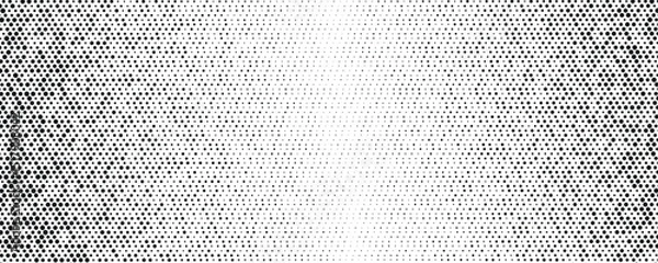 Fototapeta Half tone dots gradient background. Halftone faded gradient texture.