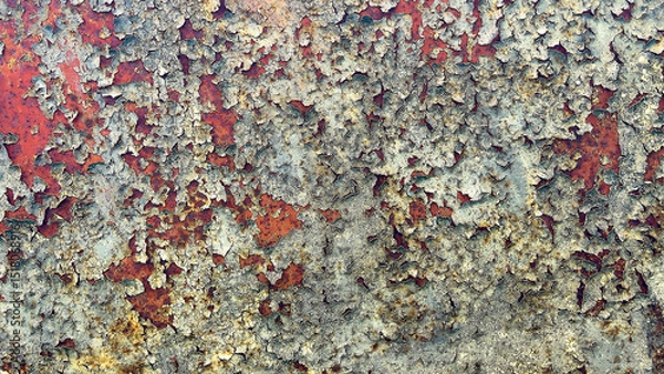 Fototapeta Rust and peeling paint texture on metal surface. Abstract industrial background, perfect for design projects, posters, and graphic overlays.