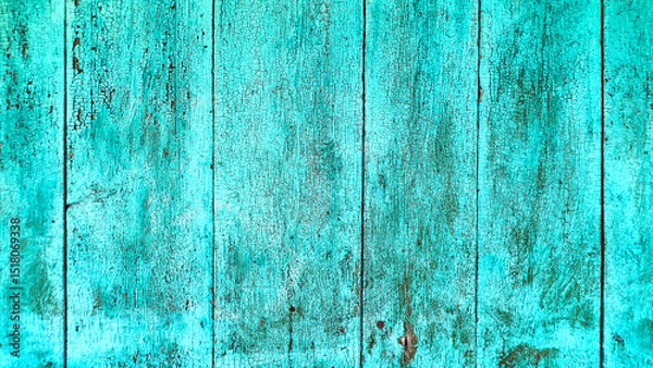 Fototapeta Cracked and weathered turquoise paint on old wooden surface. Perfect rustic background for design projects, websites, posters, and vintage-style artwork.
