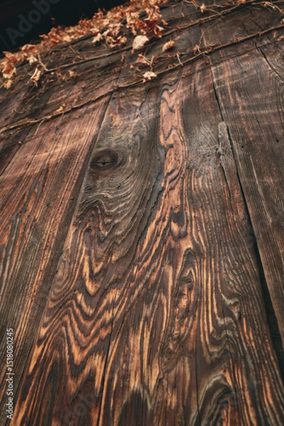 Fototapeta Close up texture and pattern weathered wooden wall the planks, a part of an outdoor structure building