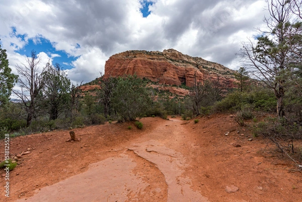 Obraz Sedona, Arizona, red rock formations and scenic landscapes under dramatic cloud-filled skies, capturing the natural beauty of the desert wilderness.