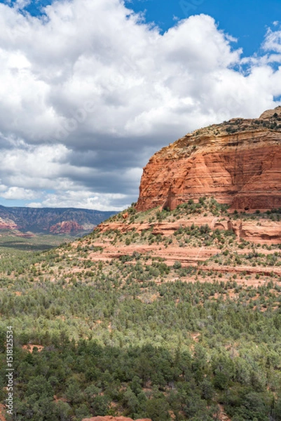Obraz Sedona, Arizona, red rock formations and scenic landscapes under dramatic cloud-filled skies, capturing the natural beauty of the desert wilderness.