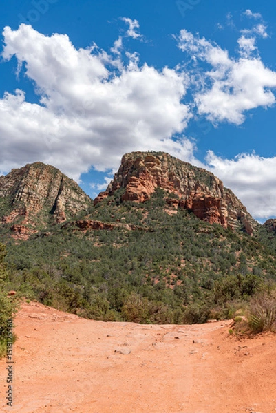 Obraz Sedona, Arizona, red rock formations and scenic landscapes under dramatic cloud-filled skies, capturing the natural beauty of the desert wilderness.