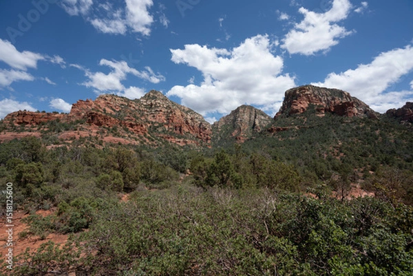 Obraz Sedona, Arizona, red rock formations and scenic landscapes under dramatic cloud-filled skies, capturing the natural beauty of the desert wilderness.