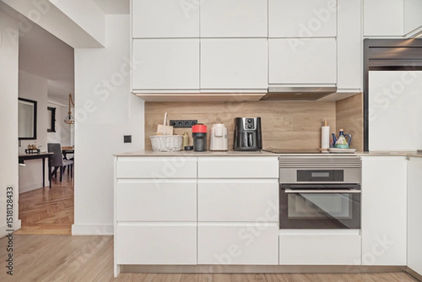 Fototapeta Modernity in these kitchens isn't sacrificed for the sake of aesthetics