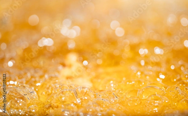 Fototapeta Close up bright orange Oil or beer splash texture and nature waves, Beautiful waves curve and little bubbles smooth for graphic design and background, Oil Bubbles, Soft beer bubbles, Selective focus