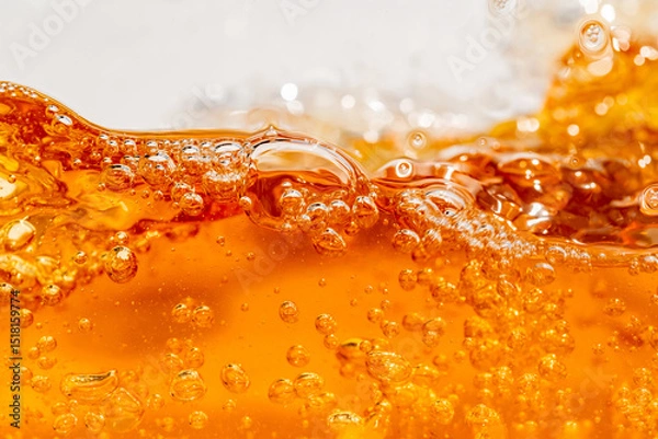 Fototapeta Close up bright orange Oil or beer splash texture and nature waves, Beautiful waves curve and little bubbles smooth for graphic design and background, Oil Bubbles, Soft beer bubbles, Selective focus
