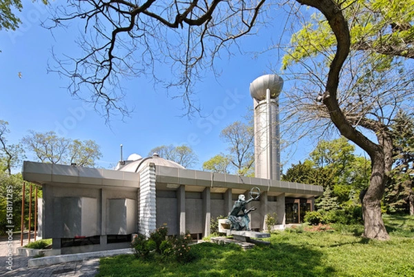 Fototapeta Nicolaus Copernicus Observatory and Planetarium in Varna, Bulgaria. Modern Architecture with Famous Astronomer Statue in the Sea Garden, Park. Science and Education.