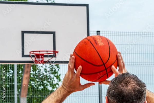 Obraz basketball player holding ball