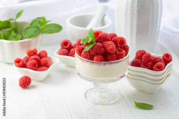 Obraz Mascarpone cream with fresh raspberries.