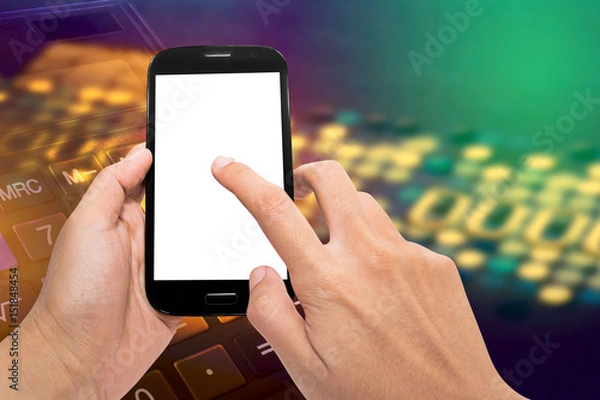 Fototapeta Vintage tone of hand holding and touch screen smart phone with credit card and caculater background.