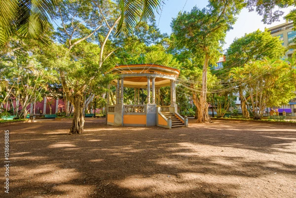 Fototapeta A small temple gazebo in the center of the 19th century Plaza del Príncipe de Asturias park, in the historic center of Santa Cruz de Tenerife Spain, on the Canary island of Tenerife.