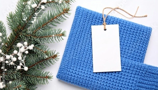 Fototapeta Blue Knitted Napkin Mockup with Blank Tag and Winter Branches