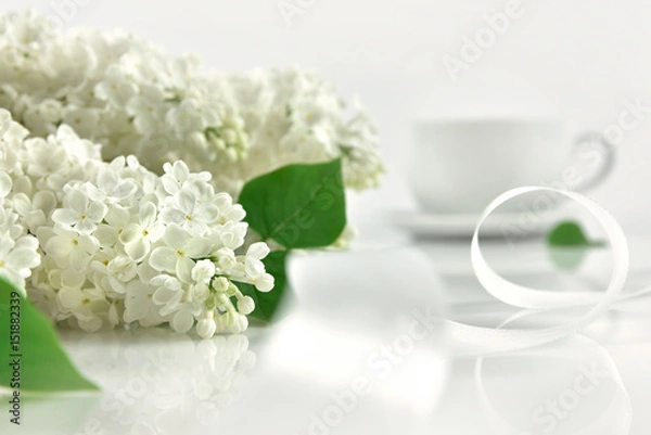 Obraz White lilac with cup of tea at the morning. Mother's day