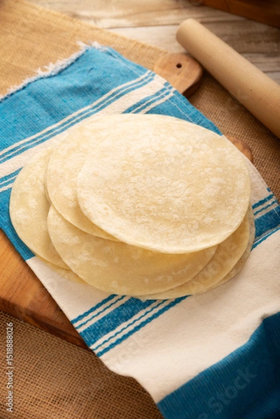 Fototapeta Tortillas de Harina, also called wheat tortilla, is a flat bread made with wheat flour and lard or butter, without yeast, and widely consumed daily in Mexico, especially in the north of the country.