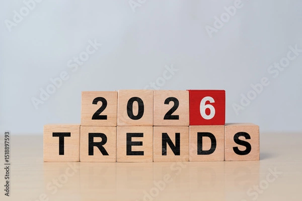 Obraz Hand flipping wooden block cube to change from 2025 to 2026 trends for business , fashion and technology trend change concept after new year
