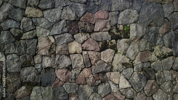 Fototapeta Stack of neatly arranged rocks, textured stone background