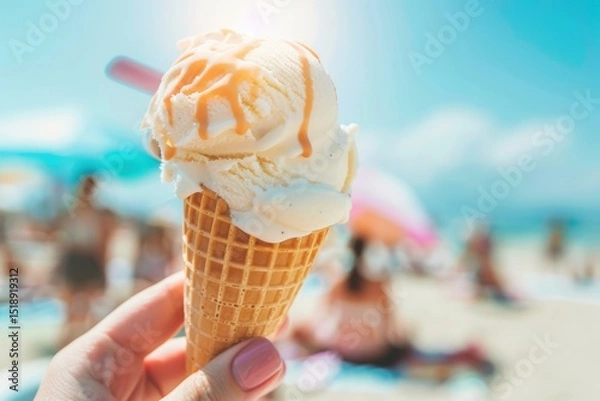Fototapeta Beach Day Delight: Ice Cream Cone by the Sea