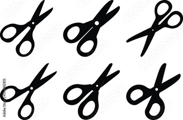 Fototapeta Black scissor silhouettes in different shapes, oriented in different directions, set on white