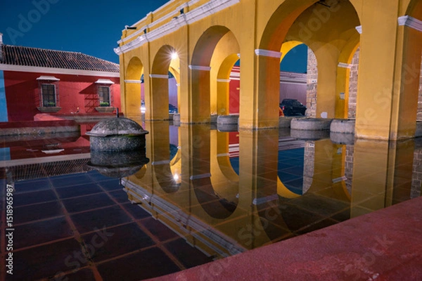 Obraz Colonial arches of Tanque La Union in Antigua Guatemala at night
