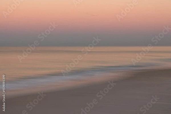 Fototapeta Smooth abstract ocean water waves under pink, blue, pastel sky