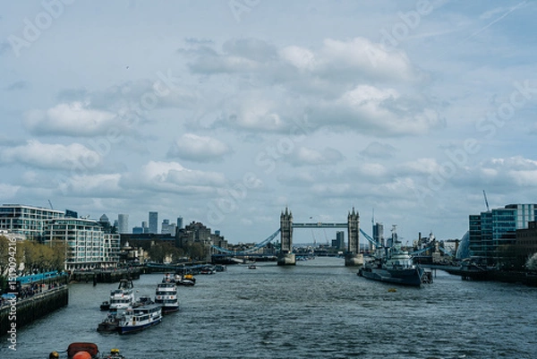 Fototapeta View of Tower Bridge and River Thames under cloudy sky
