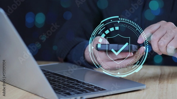 Fototapeta Access control through user authentication and identity verification. Businessman using laptop computer with device authentication.