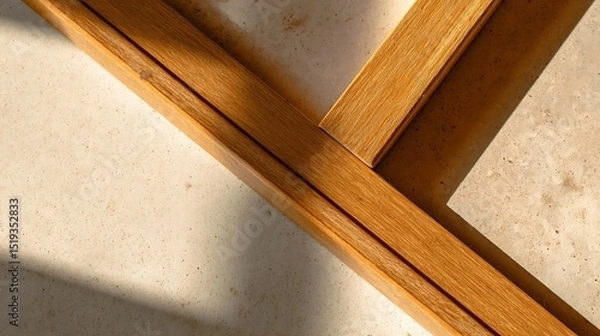 Obraz Wooden frame on light surface, minimalist Scandinavian style with soft shadows. Simplicity and natural elegance in home decor.