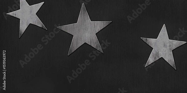 Fototapeta Stylized metallic stars against a dark background, perfect for creative designs and artistic themes.