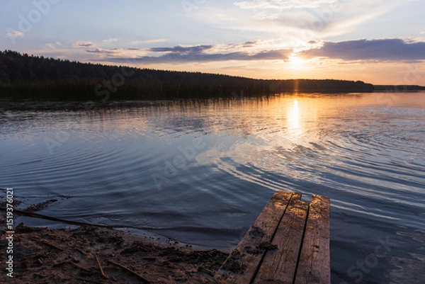 Obraz Beautiful sunset over a tranquil lake, featuring a wooden pier