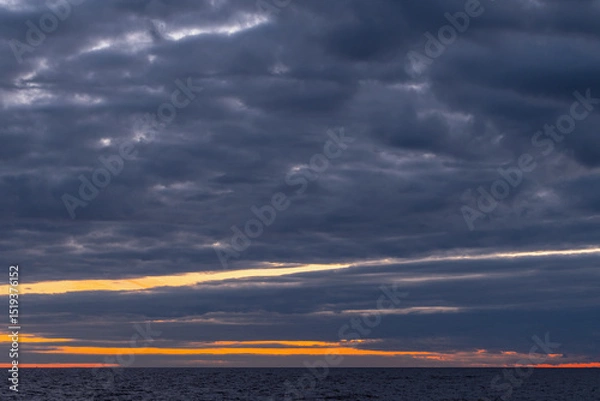Obraz Coastal landscape photo featuring dark cloudy sky over the horizon